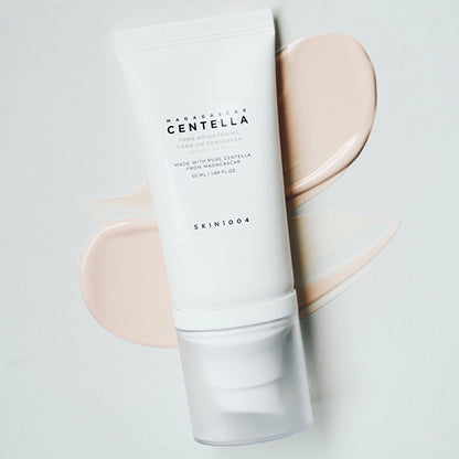Skin1004 مدغشقر سينتيلا: واقي شمس لتفتيح البشرة SPF50+ PA++++ 50 مل